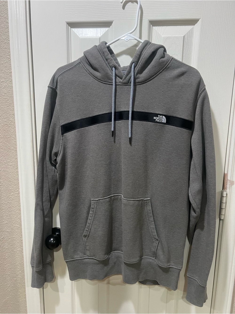 The North Face Gray Pullover Hoodie with Black Chest Stripe